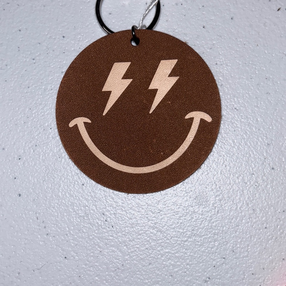Leather smiley face keychain